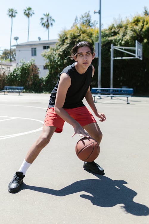 Free A Boy Playing Basketball Stock Photo